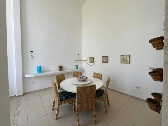 Imagem Sobrado luxuoso de alto padrão à venda condomínio Bougainville frente praia