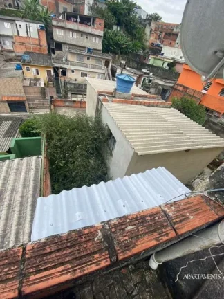 Imagem Terreno com 3 Casas com 3 vagas de carro e moto.