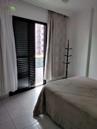 Imagem APARTAMENTO MOBILIADO Á VENDA, COM 2 QUARTOS, 84,00m2 - PÉ NA AREIA - VISTA PARA O MAR - PRAIA GRANDE/SP