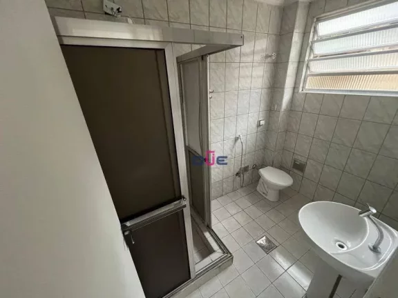 Imagem Apartamento com 2 dormitórios em 1 andar de frente com garagem box privativa à venda, 76 m² por R$ 424.000 - Vila Matias - Santos/SP