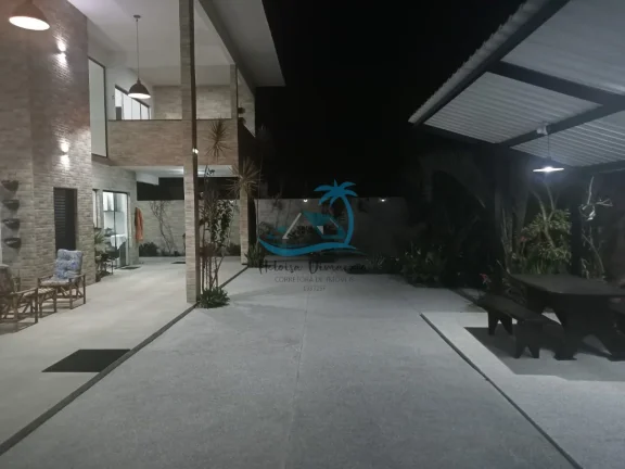 Imagem Casa de alto padrão a venda com 4 dormitórios, 360m² de área construída - Jardim Carolina em Ubatuba.