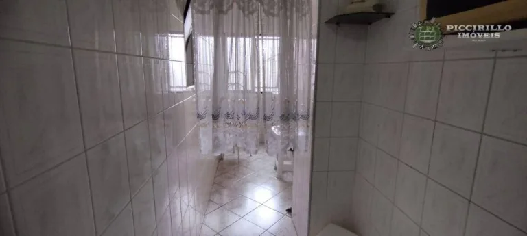 Imagem Apartamento com 2 dormitórios à venda, 63 m² por R$ 330.000,00 - Aviação - Praia Grande/SP