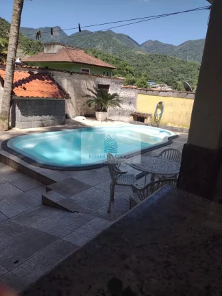 Imagem Casa em condomínio à venda no Rio de Janeiro-RJ, bairro Taquara: 3 quartos, 1 suíte, 2 salas, 2 banheiros, 1 vaga, 200m².