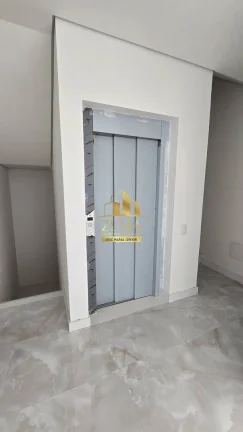 Imagem Sobrado alto padrão em condomínio, 560 m2, Elevador, 04 suites ( 01 Master)