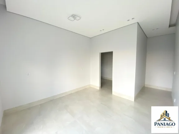 Imagem Casa de alto padrão com 3 suítes, cozinha gourmet e piscina com cascata