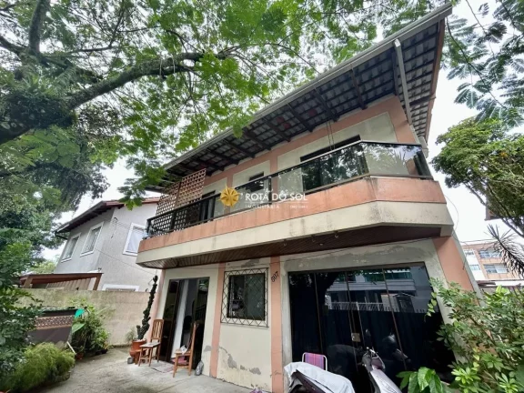 Imagem Terreno de quadra com 2 casas à venda Bombas Bombinhas SC