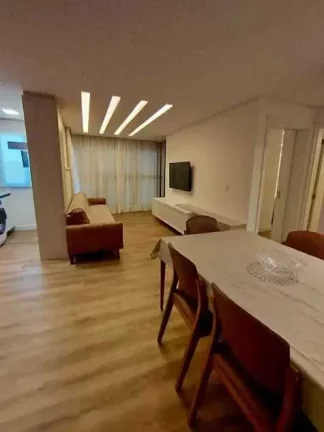 Imagem Apartamento vista mar mobiliado com 2 dormitórios sendo 1 suíte e 1 vaga de garagem na Brava