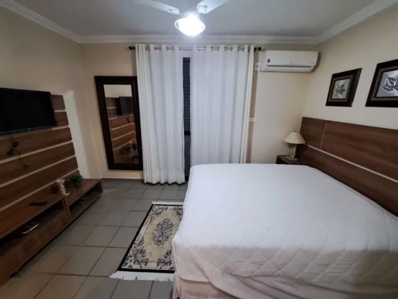Imagem AMPLO APARTAMENTO COM 4 DORMITÓRIOS, SENDO 3 SUÍTES E O 4º DORMITÓRIO OPCIONAL, 2 VAGAS, VARANDA ESTENDIDA, NA REGIÃO NOBRE DA PITANGUEIRAS NO GUARUJÁ