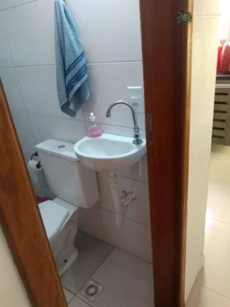 Imagem Sobrado Compacto e Moderno no Maracanã, Praia Grande/SP – Oportunidade Única!
