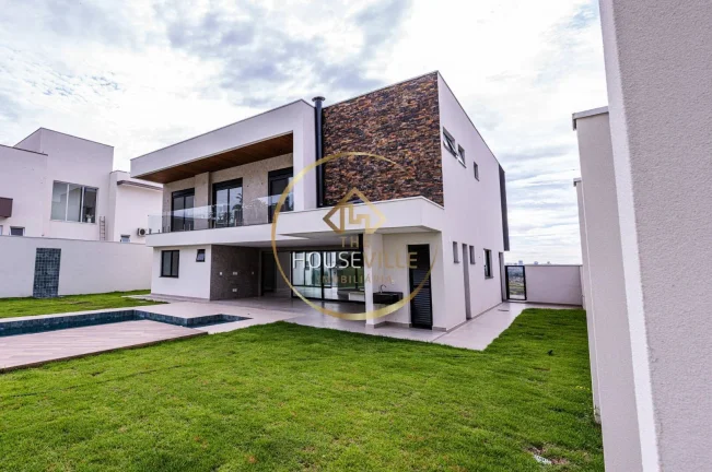 Imagem Casa Sobrado, 4 dormitórios ( 4 suítes), 4 vagas, Cond. Paratehy Norte Sjc.