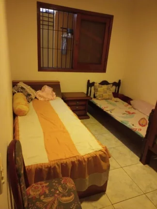 Imagem Casa com 2 dormitórios à venda, 72 m² por R$ 450.000 - Caiçara - Praia Grande/SP