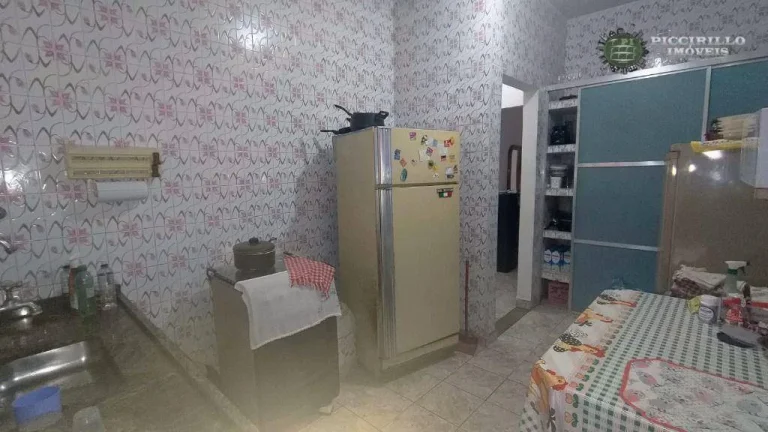 Imagem Casa com 3 dormitórios à venda, 240 m² por R$ 700.000,00 - Caiçara - Praia Grande/SP