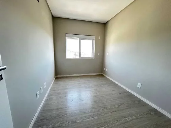 Imagem Apartamento com 3 dormitórios sendo 1 suíte e 2 vagas de garagem - Bairro Fazenda Itajaí/SC