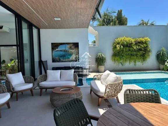 Imagem Luxuosa Casa nova e atualizada em Condomínio à Venda no Jardim Acapulco, Guarujá-SP: 6 Quartos, 6 Suítes, 3 Salas, 7 Banheiros, 6 Vagas, 530m²