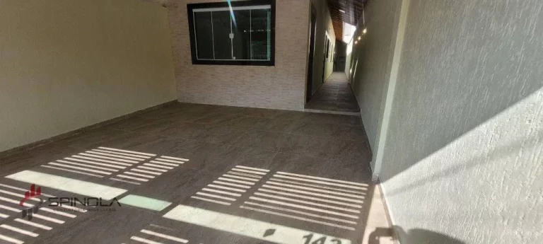 Imagem Casa com 2 dormitórios à venda, 110 m² por R$ 585.000,00 - Maracanã - Praia Grande/SP