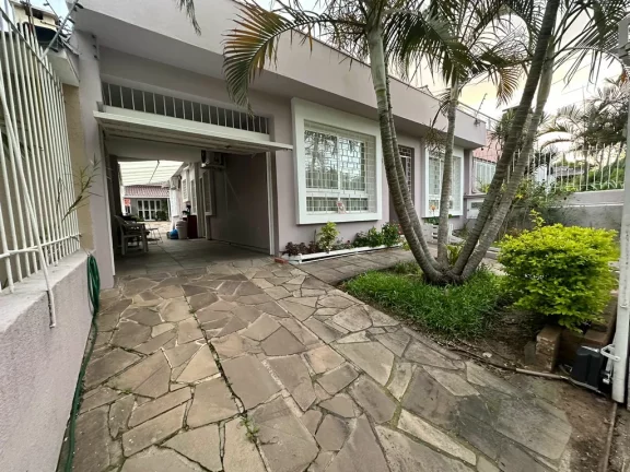Imagem Casa de condomínio à venda em Porto Alegre, Petrópolis, com 3 quartos, 165m2