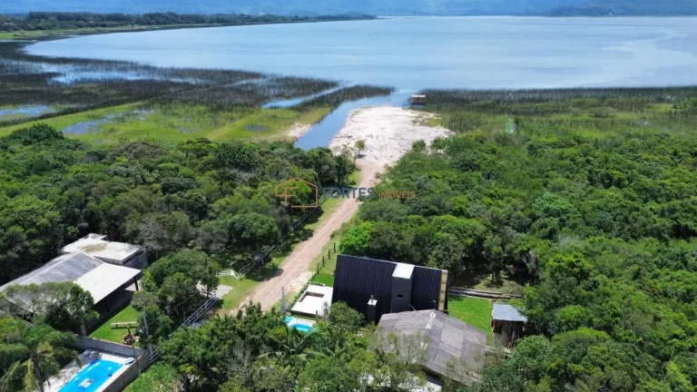 Imagem casa com lagoa, acesso a lagoa, lagoa, piscina, condomínio