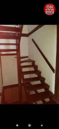 Imagem Triplex com 3 dormitórios à venda, 112 m² por R$ 440.000 - Jardim Três Marias - Guarujá/SP