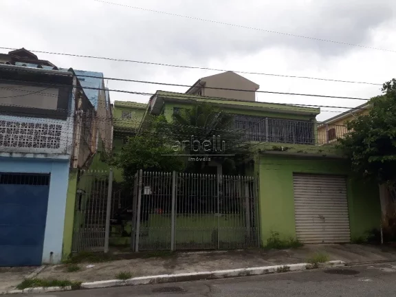 Casa térrea e sobrado construídos em um terereno com 224 metros quadrados ( com 11,5 X 19,50 ) e 2...