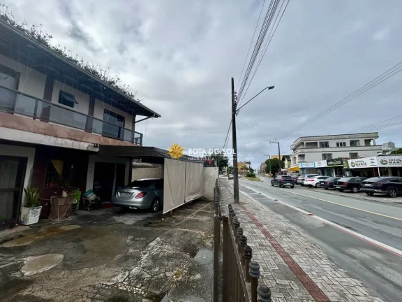 Imagem Terreno de quadra com 2 casas à venda Bombas Bombinhas SC