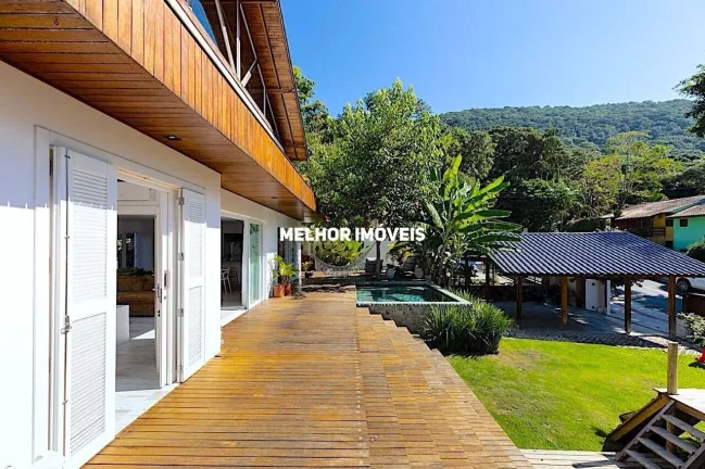Imagem Casa espaçosa á venda com 03 dormitórios sendo 02 suítes localizada na Praia de Taquaras/SC