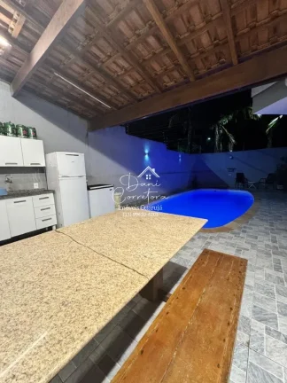 Imagem Casa Jardim Virginia com 4 quartos, 4 suítes, 3 salas e 8 vagas de garagem no Guarujá-SP, bairro Loteamento João Batista Julião!