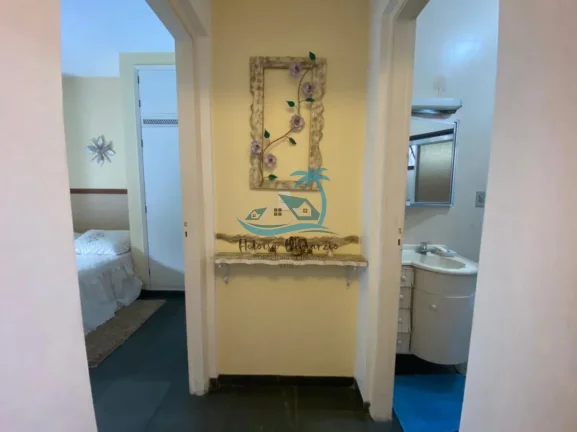 Imagem Belíssimo apartamento com 3 dormitórios na Praia da Enseada em Ubatuba - ao lado da praia, mais ou menos 50 metros do mar.