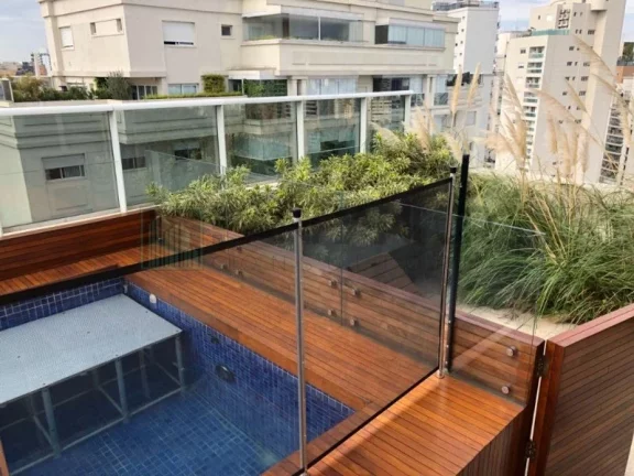 Imagem Luxuosa cobertura duplex de alto padrão na cobiçada Vila Nova Conceição, com incríveis 411m² e 5 vagas de garagem. Com um design clean e moderno, as