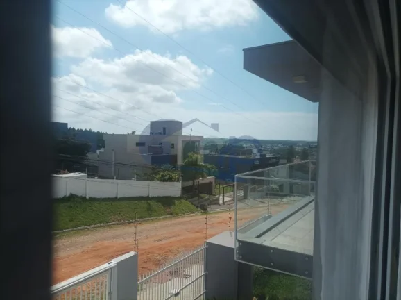 Imagem Casa de alto padrão á venda com 4 suites no bairro Centenário em Torres/RS
