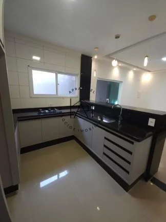 Imagem Casa para Venda em Praia Grande, Mirim, 2 dormitórios, 1 suíte, 3 banheiros, 3 vagas