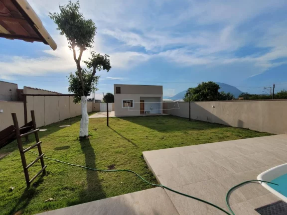 Imagem Casa com excelente quintal e área gourmet/ lazer com mini parquinho.