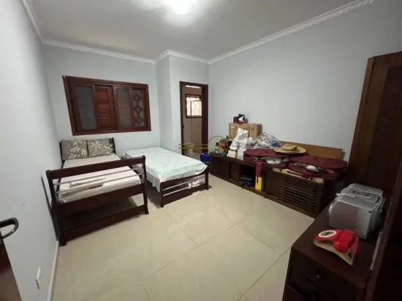 Imagem Sobrado à venda em Peruíbe/SP Condomínio Bougainville II Porteira fechada