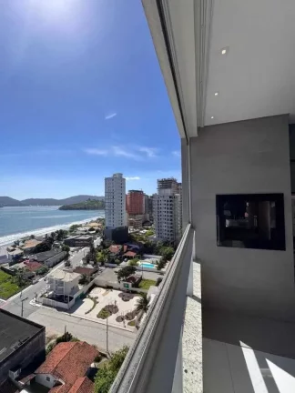 Imagem Apartamento vista mar com 2 suítes e 3 vagas de garagem em Balneário Perequê