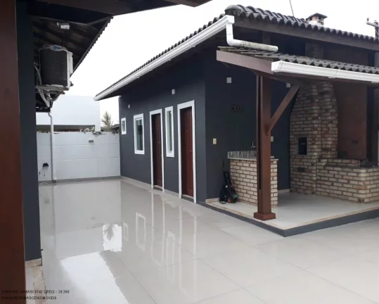 Imagem Casa de Alto Padrão em Condomínio à Venda em Camaçari-BA - 3 quartos, 1 suíte, 2 salas, 1 banheiro, 4 vagas, 130,00 m².