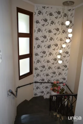 Imagem Casa em Camobi com 05 dormitórios, suíte master, lareira, piscina