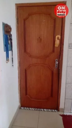 Imagem Apartamento com 2 dormitórios à venda, 64 m² por R$ 220.000,00 - Saboó - Santos/SP