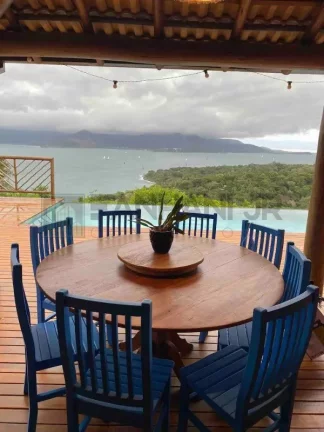 Imagem Venha viver o paraíso na Praia do Curral, em Ilhabela, em uma linda casa em condomínio de alto padrão, localizada ao lado do renomado hotel DPNY. Com