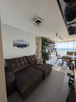 Imagem Apartamento vista mar com 2 suítes e 3 vagas de garagem em Balneário Perequê