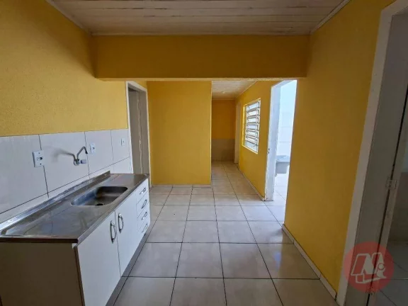 Imagem Casa com 3 dormitórios para alugar, 56 m² por R$ 1.916,00/mês - Medianeira - Porto Alegre/RS
