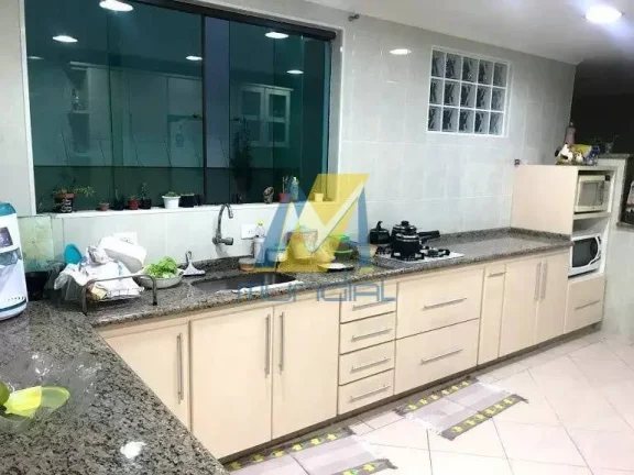 Imagem Casa incrível à venda: 4 dormitórios, 3 vagas e espaço gourmet completo