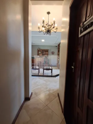 Imagem Imperdível: Casa à venda em Itatiaia-RJ, 5 quartos, 2 suítes, 1 sala, 5 banheiros, 4 vagas, 373,64m² de área. Confira já!