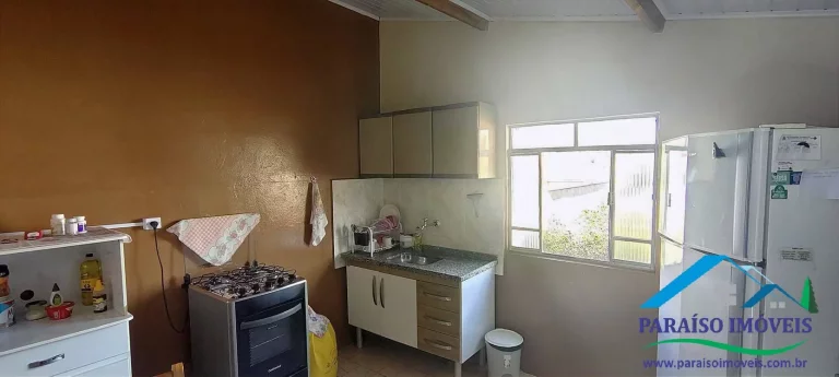 Imagem Casa no Centro com 4 Dormitórios com Amplo Terreno - Paraisópolis MG