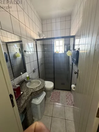 Imagem Imperdível Casa à venda em Criciúma-SC, Bairro Mina Brasil: 4 quartos, 1 suíte, 3 salas, 4 banheiros, 3 vagas, 220m2!
