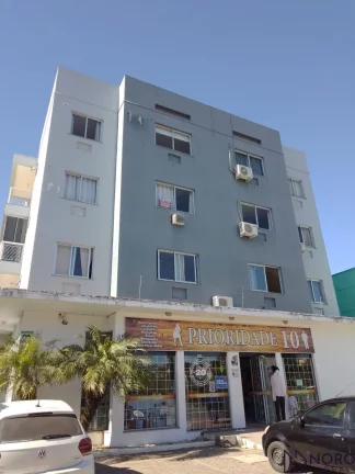 Apartamento 2 dormitórios, 1 suite, com box de garagem no bairro Tancredo Neves