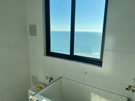 Imagem Apartamento vista mar com 3 suítes e 2 vagas de garagem em Balneário Perequê - SC