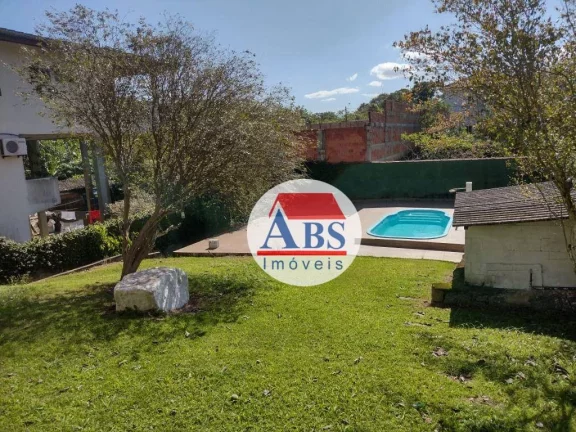 Imagem Casa com 4 dormitórios à venda, 240 m² por R$ 1.600.000,00 - Morro de Nova Cintra - Santos/SP