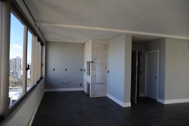 Apartamento alto padrão com 4 suítes e 2 vagas de garagem em Passo Fundo/RS