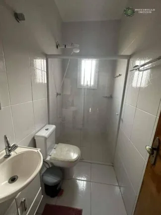 Imagem Sobrado com 3 dormitórios à venda, 125 m² por R$ 650.000 - Caiçara - Praia Grande/SP
