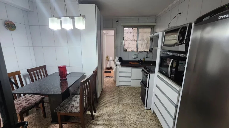 Imagem Venda de Casa/Sobrado no Embaré, Santos - Oportunidade Única em Localização Privilegiada