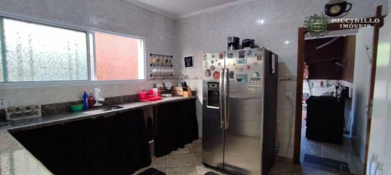 Imagem Sobrado com 3 dormitórios à venda, 118 m² por R$ 680.000,00 - Canto do Forte - Praia Grande/SP